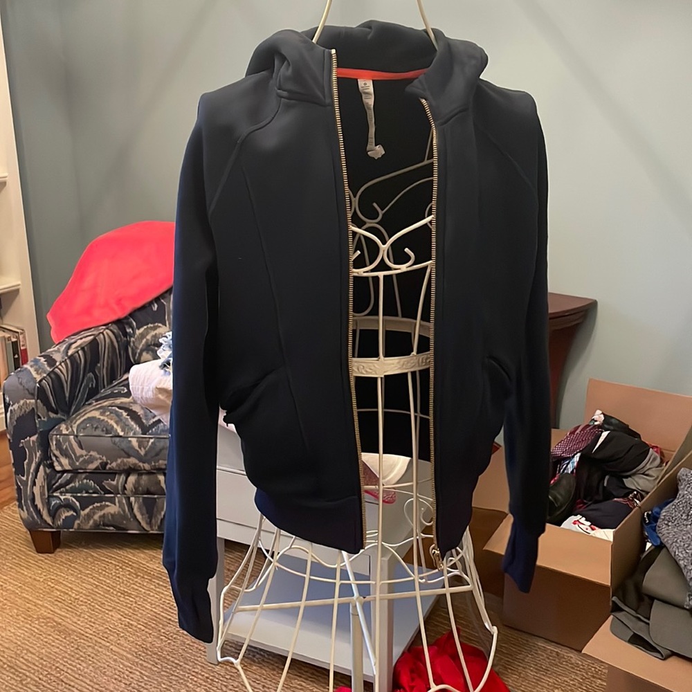 Navy blue zip up hooded sweatshirt